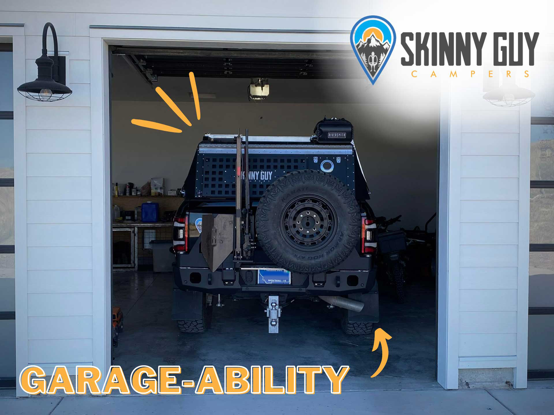 A large overland truck with a rooftop tent fits snugly in a residential garage, illustrating the concept of "Garage-Ability." The image is branded with the Skinny Guy Campers logo at the top right corner.