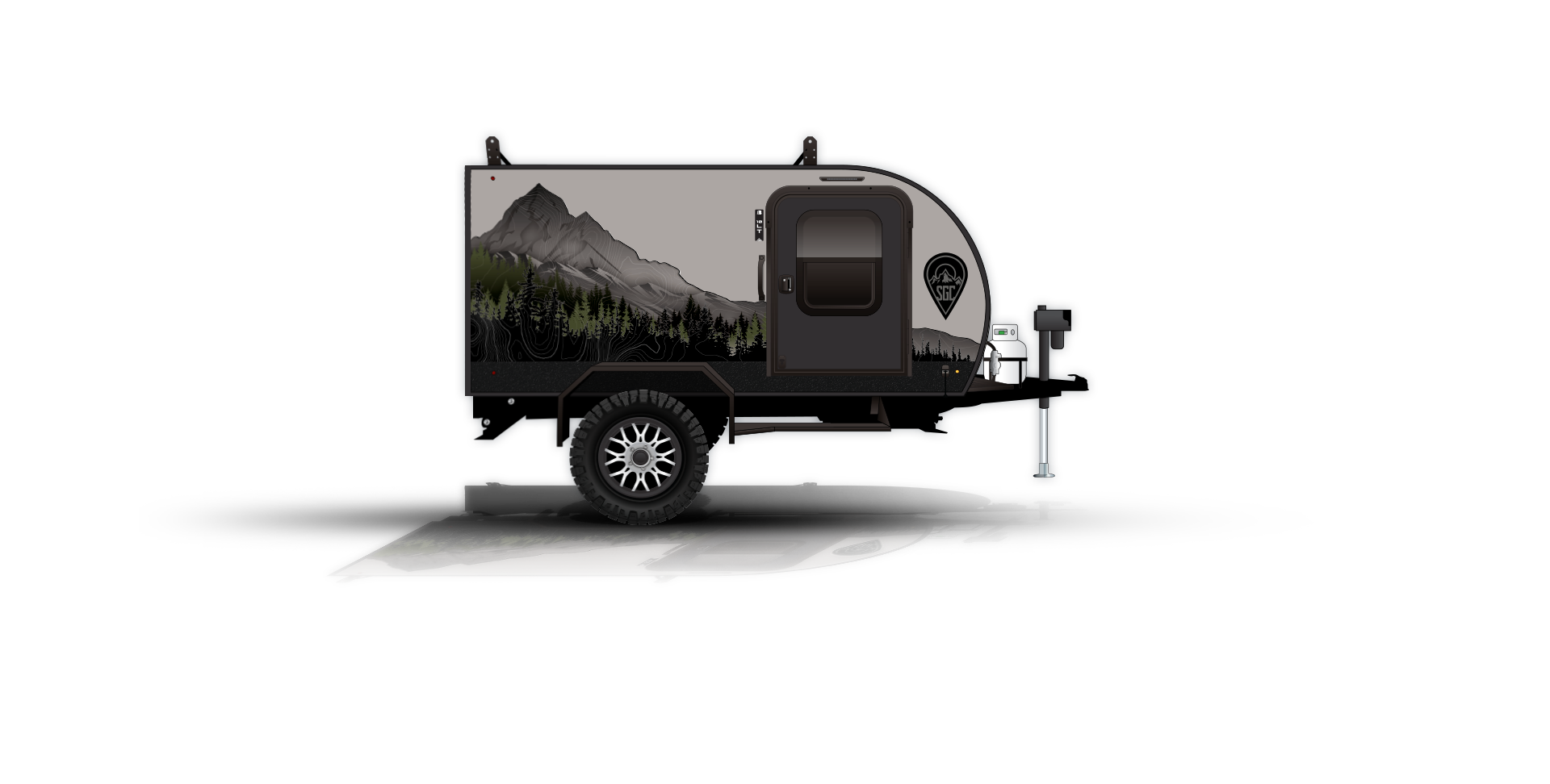 Illustration of a compact camping trailer with mountain and forest graphics on its side. It has a single door, a small window, an attached wheel, and a round support at the front. The trailer casts a shadow on the ground.