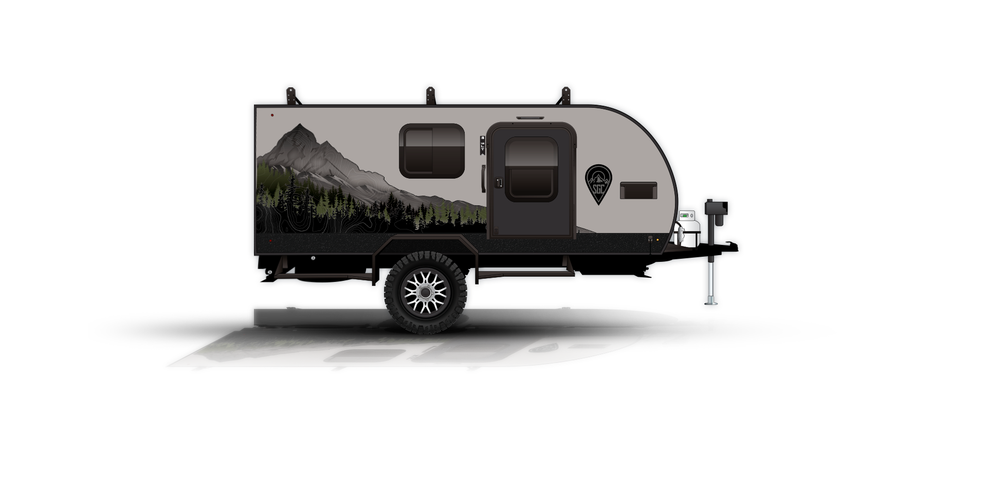 Side view of a compact travel trailer with mountain and forest graphics on its side. It features large wheels, a small window, and a door. The trailer is on a reflective surface, emphasizing its sleek design.